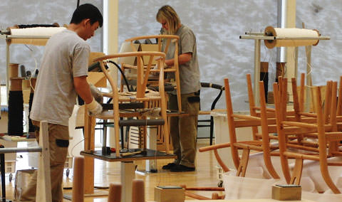 The stringing takes 120 metres of paper cord and takes an hour for the Wishbone Chair