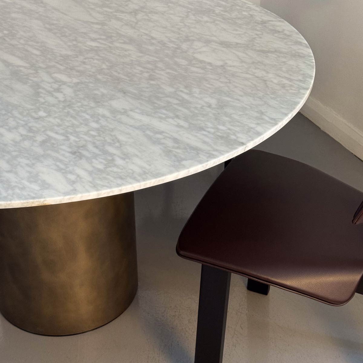 Ex Display Creso Dining Table 130cm | Glossy White Carrara Marble Top and Orbital Bronze Matt Painted Base