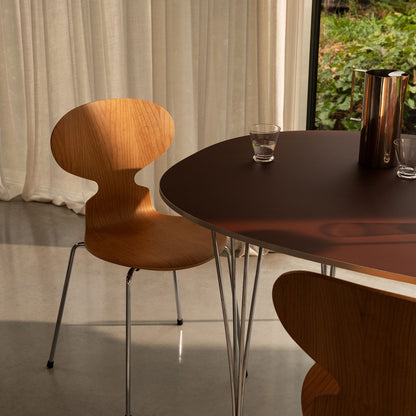 Superellipse Dining Table | Rusty Red Fenix Top