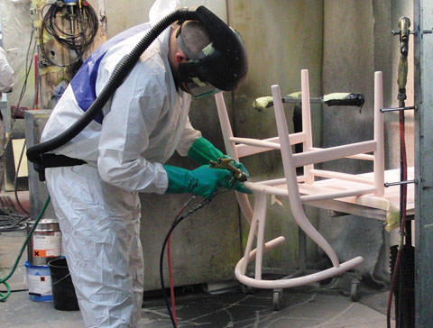 Lacquer is carefully applied in seven separate coats