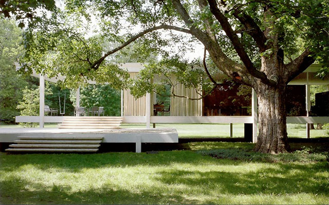The Edith Farnsworth House, shaded by trees